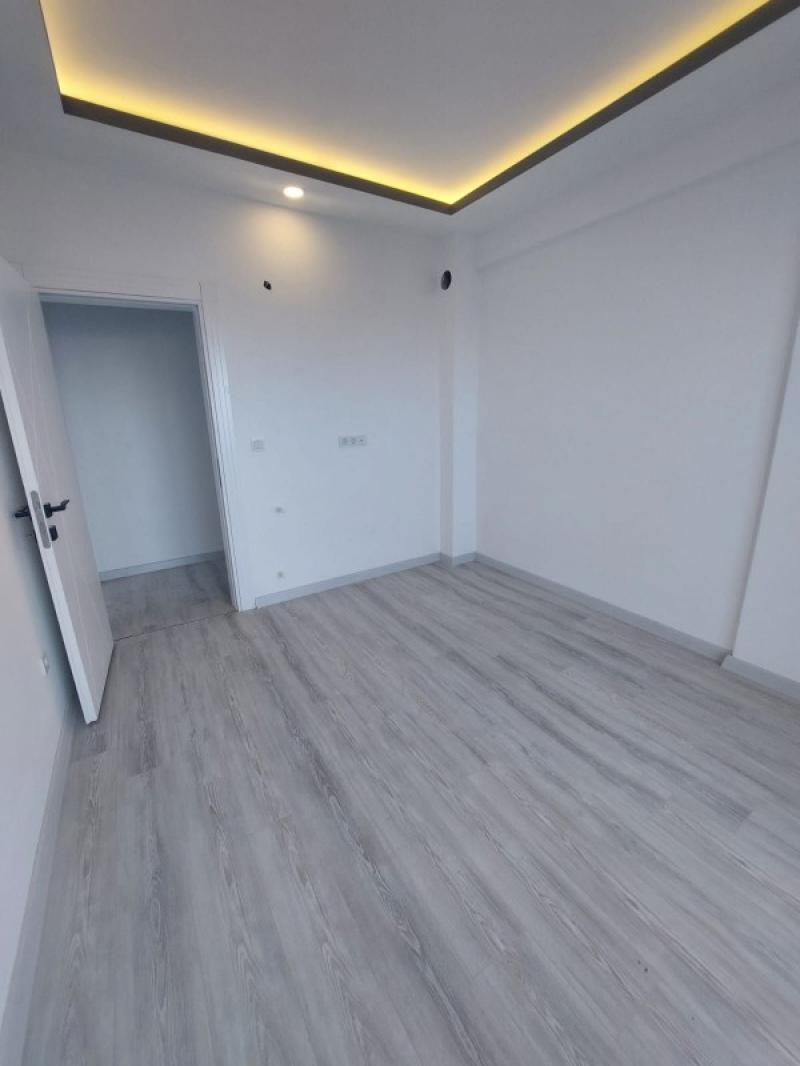 KUŞADASINDA DENİZ MANZARALI HAVUZLU SATILIK 2+1DAİRELER