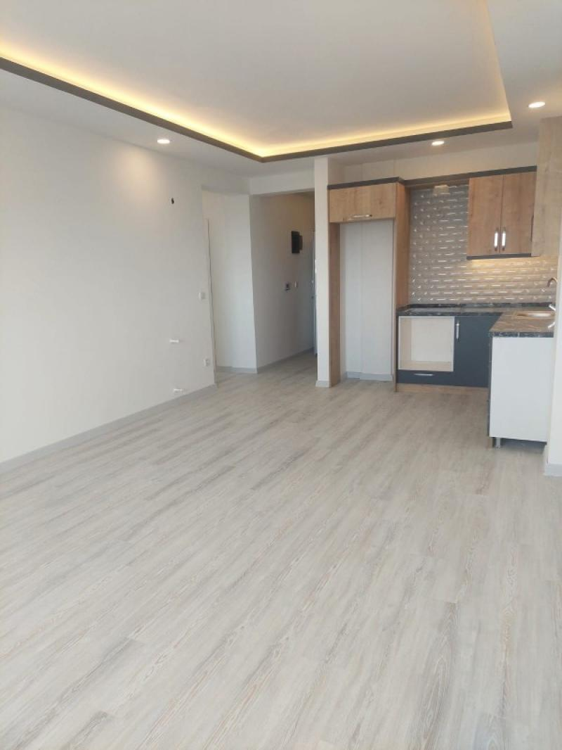 KUŞADASINDA DENİZ MANZARALI HAVUZLU SATILIK 2+1DAİRELER