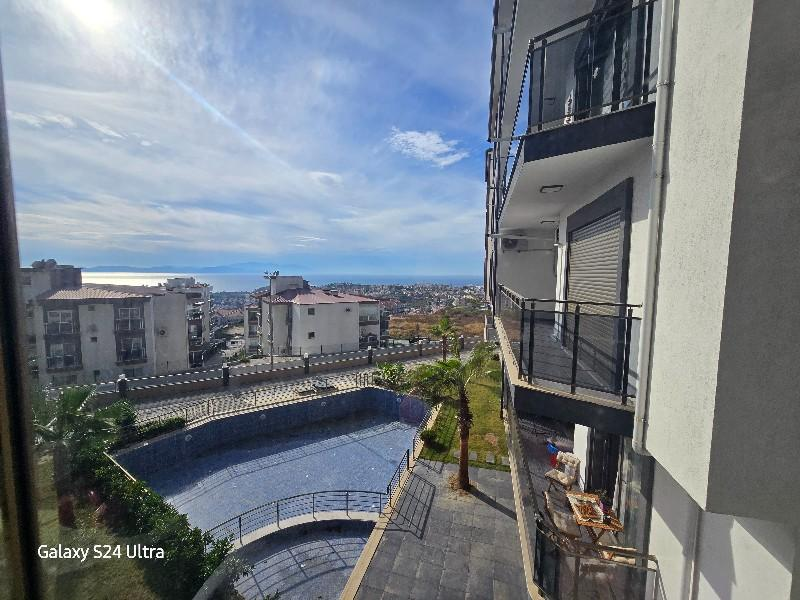 KUŞADASI DENİZ MANZARALI DOĞALGAZLI HAVUZLU SATILIK 3+1 DAİRE