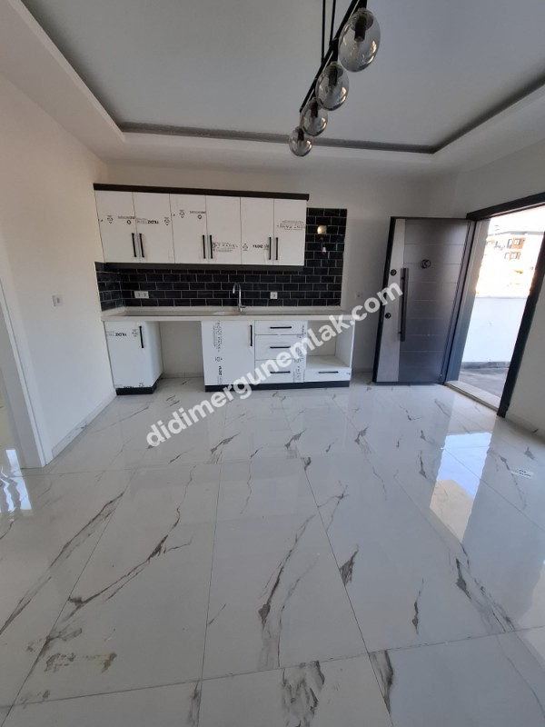 DİDİM CUMHURİYET MAHALLESİ’NDE MERKEZİ KONUMDA 1+1 BU FİYATA MERKEZDE DAİRE ZOR BULUNUR..