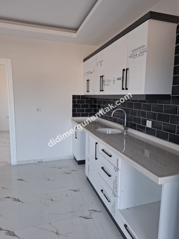 DİDİM CUMHURİYET MAHALLESİ’NDE MERKEZİ KONUMDA 1+1 BU FİYATA MERKEZDE DAİRE ZOR BULUNUR..
