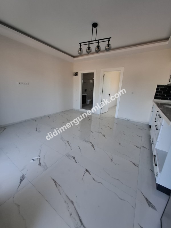 DİDİM CUMHURİYET MAHALLESİ’NDE MERKEZİ KONUMDA 1+1 BU FİYATA MERKEZDE DAİRE ZOR BULUNUR..
