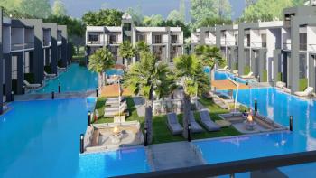 Kıbrıs İskele Long Beach Bölgesinde Ayrıcalıklı Yaşam Sunan Taşınmaya Hazır Satılık 1+0 Penthouse Daireler