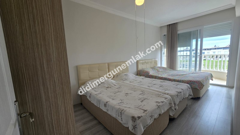 ÇAMLIK MAHALLESİ’NDE ADNAN MENDERES BULVARI' NA YAKIN - SİTE İÇERİSİNDE - EŞYALI 2+1 SATILIK DAİRE