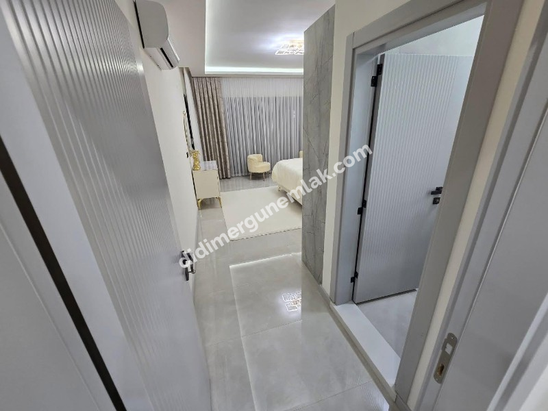 DİDİM EFELER MAHALLESİNDE TAM MÜSTAKİL HAVUZLU OTOPARKLI EŞYALI 4+1  SATILIK SIFIR  LÜKS VİLLA   