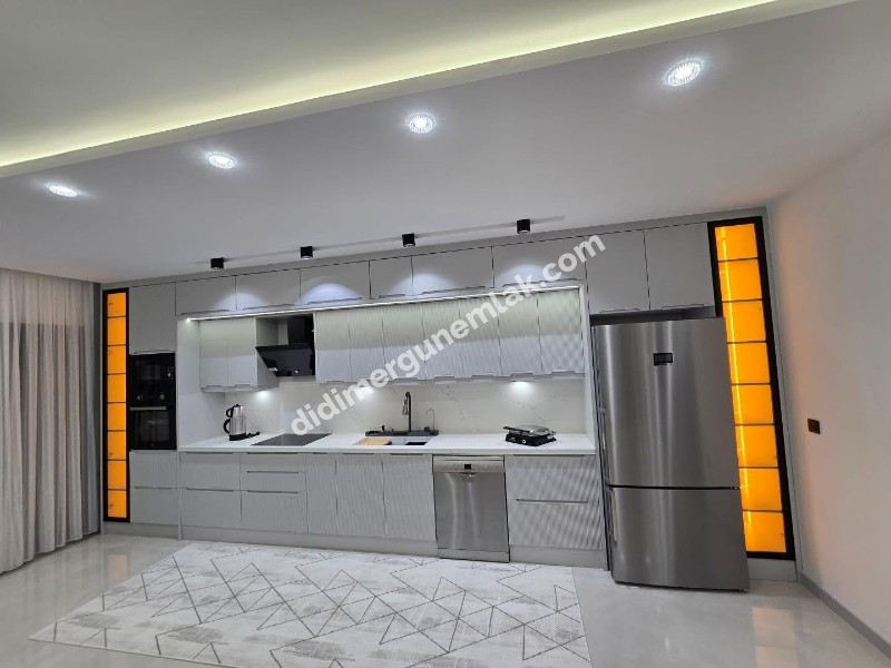 DİDİM EFELER MAHALLESİNDE TAM MÜSTAKİL HAVUZLU OTOPARKLI EŞYALI 4+1  SATILIK SIFIR  LÜKS VİLLA   