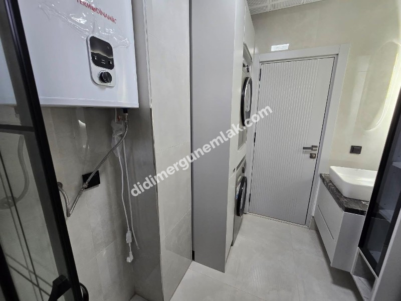 DİDİM EFELER MAHALLESİNDE TAM MÜSTAKİL HAVUZLU OTOPARKLI EŞYALI 4+1  SATILIK SIFIR  LÜKS VİLLA   