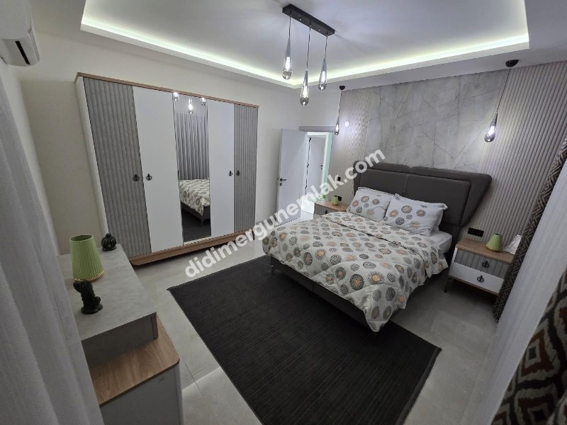 DİDİM EFELER MAHALLESİNDE TAM MÜSTAKİL HAVUZLU OTOPARKLI EŞYALI 4+1  SATILIK SIFIR  LÜKS VİLLA   