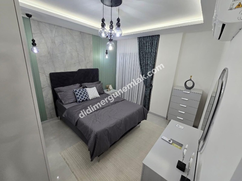 DİDİM EFELER MAHALLESİNDE TAM MÜSTAKİL HAVUZLU OTOPARKLI EŞYALI 4+1  SATILIK SIFIR  LÜKS VİLLA   