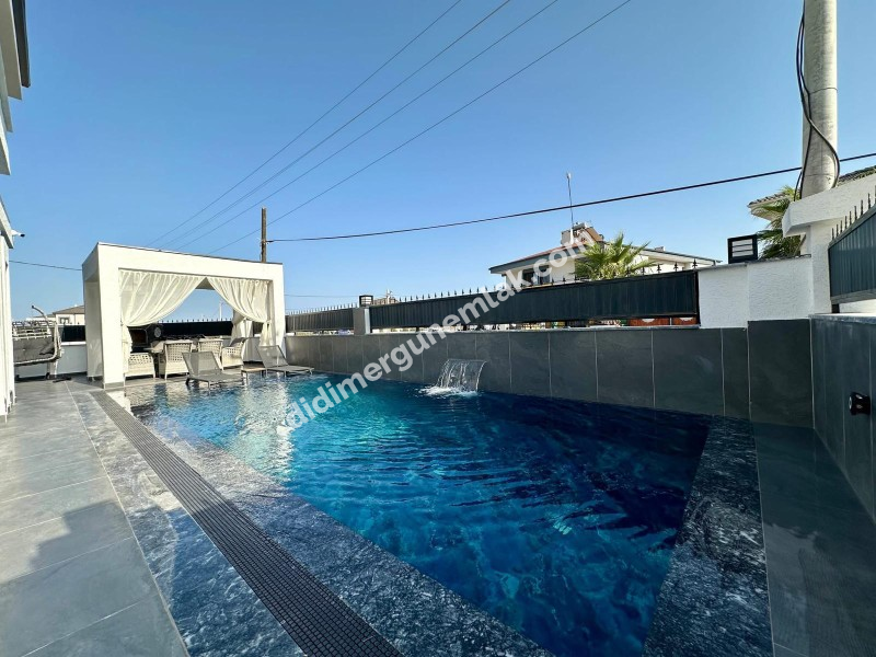 DİDİM EFELER MAHALLESİNDE TAM MÜSTAKİL HAVUZLU OTOPARKLI EŞYALI 4+1  SATILIK SIFIR  LÜKS VİLLA   