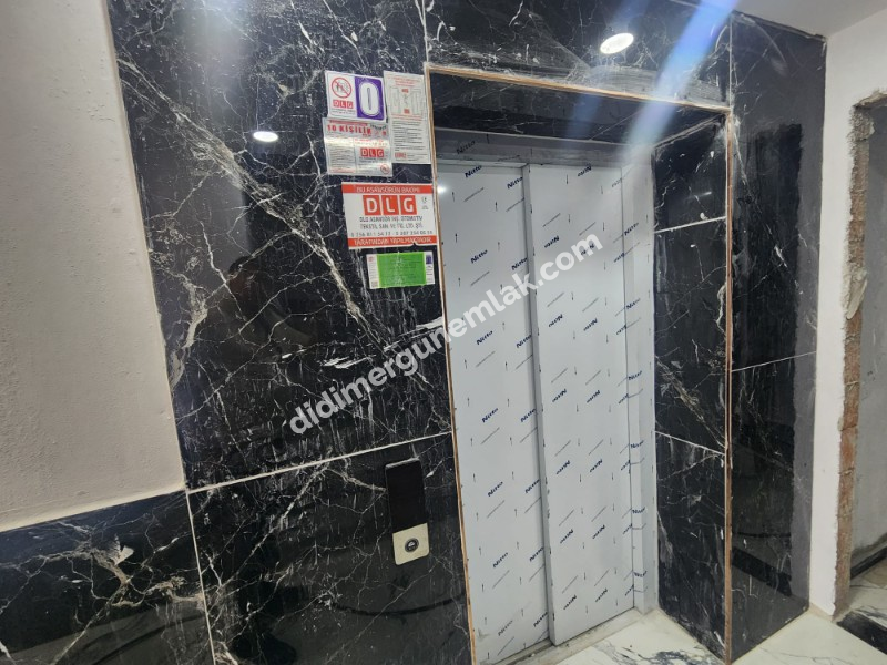 DİDİM EFELER MAHALLESİNDE STADYUM BÖLGESİNDE DENİZE YÜRÜME MESAFESİNDE SIFIR 2+1 SARTILIK DAİRE