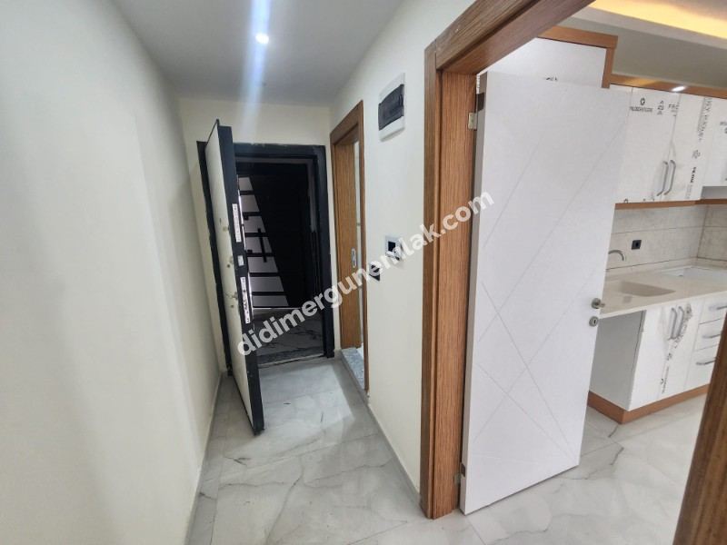 DİDİM EFELER MAHALLESİ' NDE STADYUM BÖLGESİNDE DENİZE YÜRÜME MESAFESİNDE SATILIK 1+1 DAİRE 