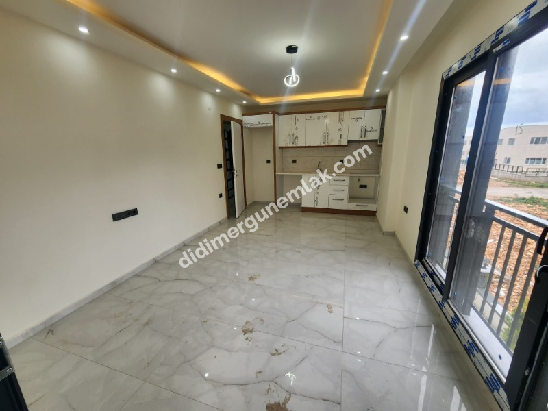 DİDİM EFELER MAHALLESİ' NDE STADYUM BÖLGESİNDE DENİZE YÜRÜME MESAFESİNDE SATILIK 1+1 DAİRE 