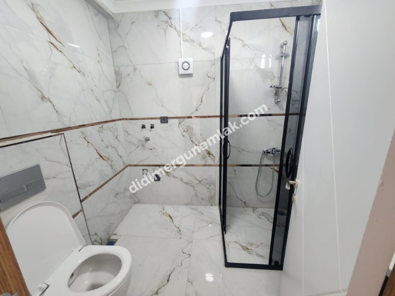 DİDİM EFELER MAHALLESİ' NDE STADYUM BÖLGESİNDE DENİZE YÜRÜME MESAFESİNDE SATILIK 1+1 DAİRE 