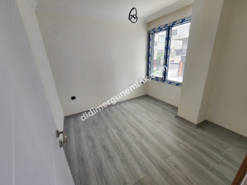 DİDİM EFELER MAHALLESİ' NDE STADYUM BÖLGESİNDE DENİZE YÜRÜME MESAFESİNDE SATILIK 1+1 DAİRE 