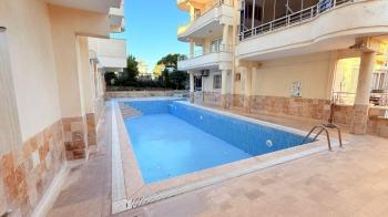 ÇAMLIK' TA HAVUZLU SİTE İÇERİSİNDE MÜSTAKİL GİRİŞLİ EŞYALI GENİŞ 3+1 SATILIK DAİRE