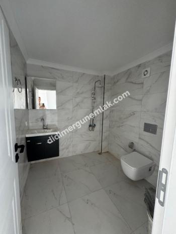 DİDİM EFELER MAHALLESİ' NDE  STADYUM BÖLGESİNDE SIFIR 1+1 SATILIK DAİRE