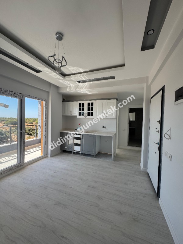 DİDİM EFELER MAHALLESİ'NDE STADYUM BÖLGESİNDE SATILIK 1+1 DAİRE