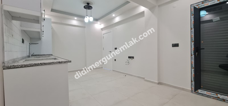 HİSAR MAHALLESİNDE ÖNÜ AÇIK CADDE ÜZERİNDE - ASANSÖRLÜ 2+1 SATILIK DAİRE