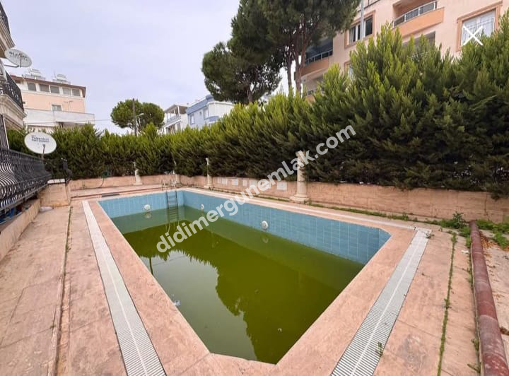 DİDİM ALTINKUM’DA DENİZE SADECE 150 METRE MESAFEDE GENİŞ VE KONFORLU 2+1 SATILIK DAİRE