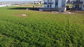 TURGUT ÖZAL MAHALLESİNDE SATILIK 382 m² KUZEY CEPHELİ ARSA