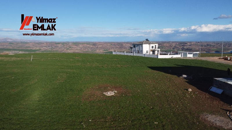 TURGUT ÖZAL MAHALLESİNDE SATILIK 382 m² KUZEY CEPHELİ ARSA