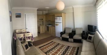 DİDİM ALTINKUM MAHALLESİ' NDE HAVUZLU SİTE İÇERİSİNDE ASANSÖRLÜ 2. KATTA 2+1 EŞYALI SATILIK DAİRE