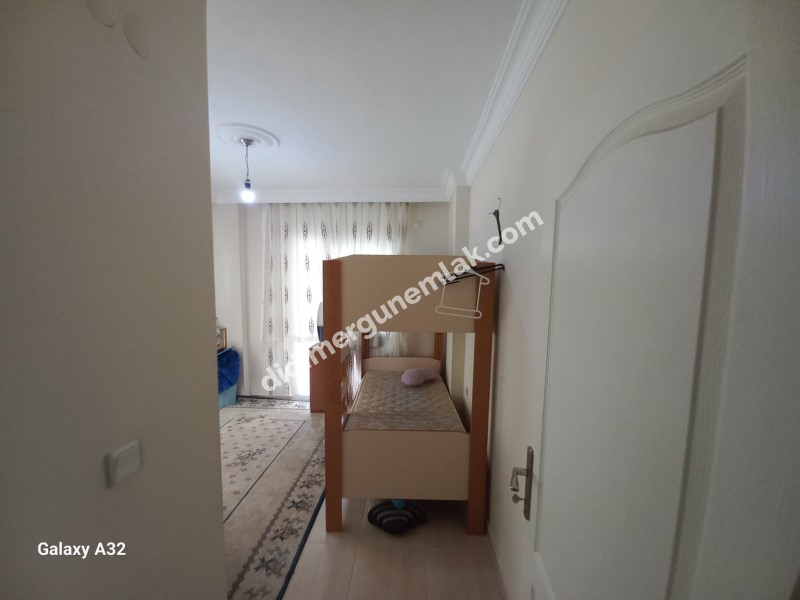 DİDİM ALTINKUM MAHALLESİ' NDE DENİZE YÜRÜME MESAFESİNDE 4 BALKONLU-PARK CEPHELİ  EŞYALI 2+1 SATILIK DAİRE