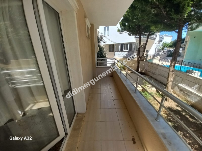 DİDİM ALTINKUM MAHALLESİ' NDE DENİZE YÜRÜME MESAFESİNDE 4 BALKONLU-PARK CEPHELİ  EŞYALI 2+1 SATILIK DAİRE