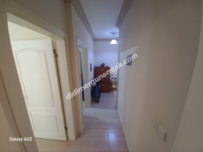 DİDİM ALTINKUM MAHALLESİ' NDE DENİZE YÜRÜME MESAFESİNDE 4 BALKONLU-PARK CEPHELİ  EŞYALI 2+1 SATILIK DAİRE