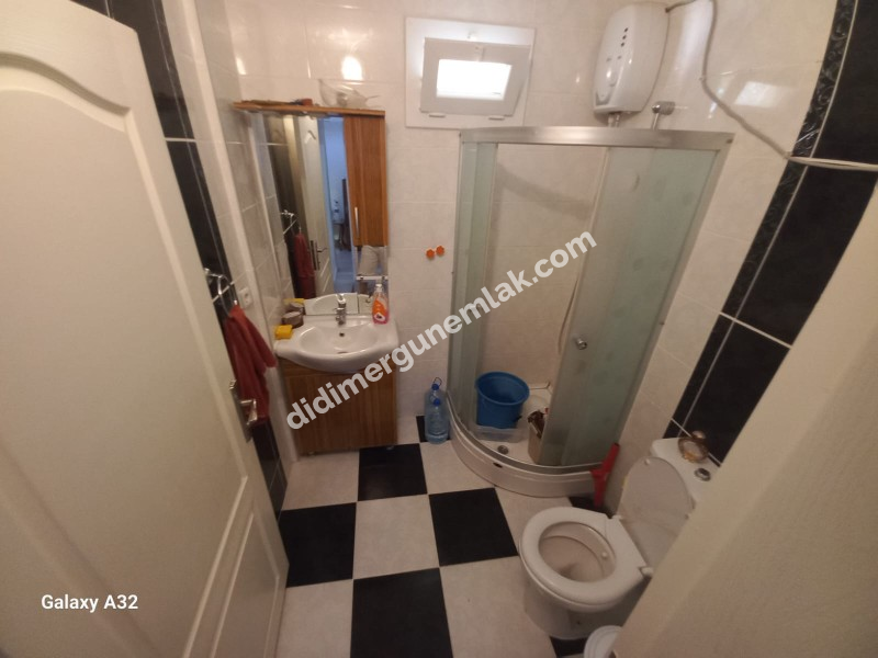 DİDİM ALTINKUM MAHALLESİ' NDE DENİZE YÜRÜME MESAFESİNDE 4 BALKONLU-PARK CEPHELİ  EŞYALI 2+1 SATILIK DAİRE