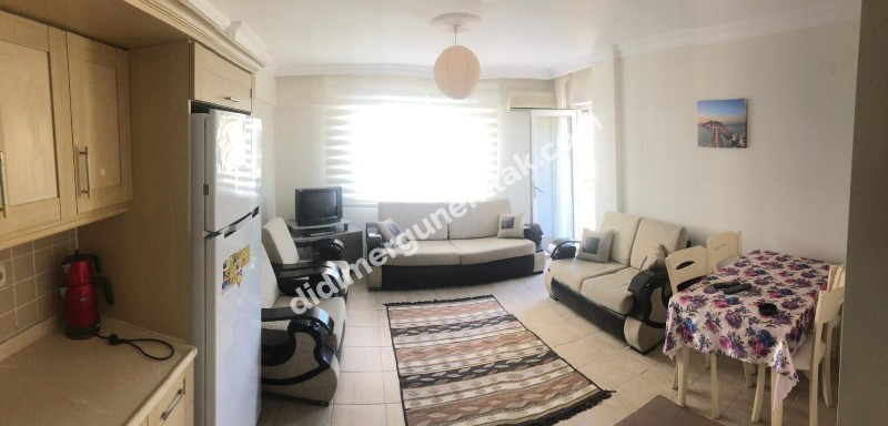 DİDİM ALTINKUM MAHALLESİ' NDE HAVUZLU SİTE İÇERİSİNDE ASANSÖRLÜ 2. KATTA 2+1 EŞYALI SATILIK DAİRE