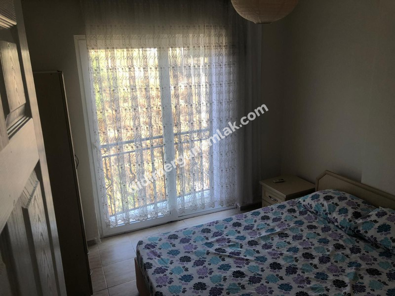 DİDİM ALTINKUM MAHALLESİ' NDE HAVUZLU SİTE İÇERİSİNDE ASANSÖRLÜ 2. KATTA 2+1 EŞYALI SATILIK DAİRE