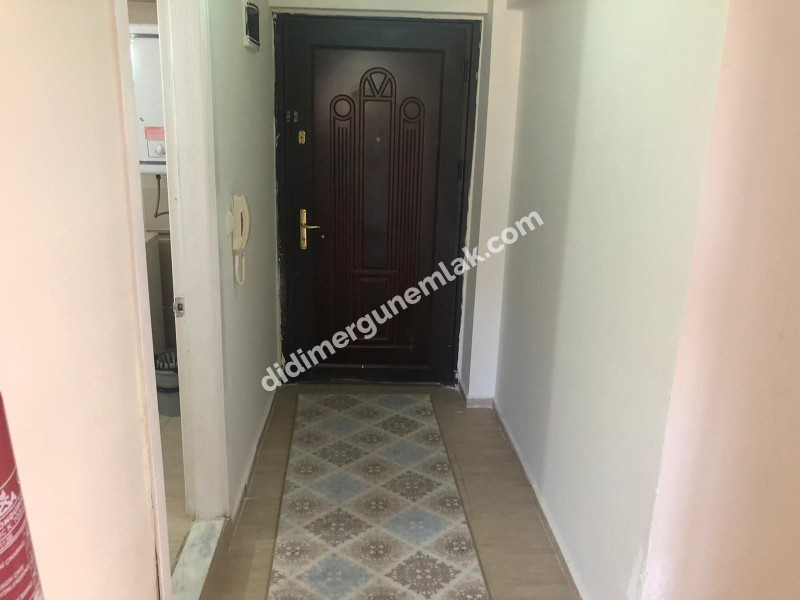 DİDİM ALTINKUM MAHALLESİ' NDE HAVUZLU SİTE İÇERİSİNDE ASANSÖRLÜ 2. KATTA 2+1 EŞYALI SATILIK DAİRE