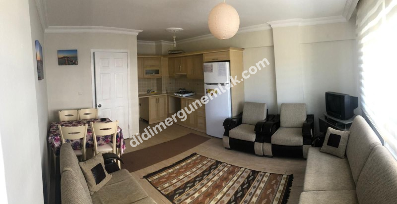 DİDİM ALTINKUM MAHALLESİ' NDE HAVUZLU SİTE İÇERİSİNDE ASANSÖRLÜ 2. KATTA 2+1 EŞYALI SATILIK DAİRE
