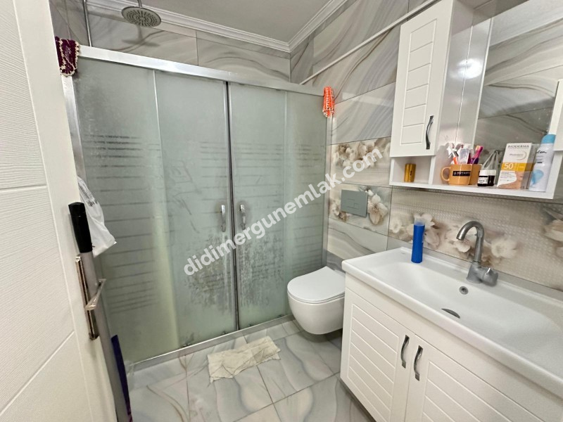 DİDİM EFELER MAHALLESİ' NDE DÜKKAN ÜSTÜ 1.KAT 3+1 SATILIK DAİRE