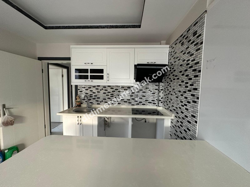 DİDİM EFELER MAHALLESİ' NDE DÜKKAN ÜSTÜ 1.KAT 3+1 SATILIK DAİRE
