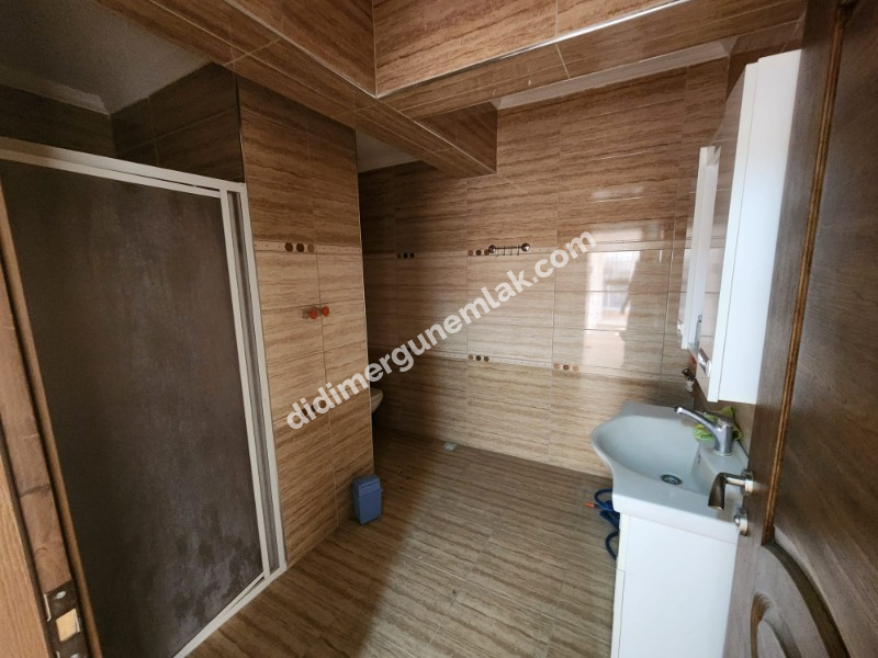 DİDİM EFELER MAHALLESİ’ NDE ÇARŞI MERKEZE YAKIN YÜKSEK GİRİŞ KAT 3+1 AYRI MUTFAK SATILIK DAİRE