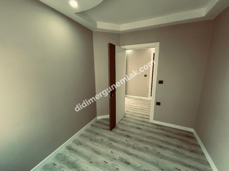 DİDİM EFELER MAHALLESİ' NDE ARA KAT FULL TADİLATLI AYRI MUTFAKLI 3+1 SATILIK DAİRE