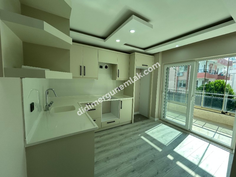 DİDİM EFELER MAHALLESİ' NDE ARA KAT FULL TADİLATLI AYRI MUTFAKLI 3+1 SATILIK DAİRE