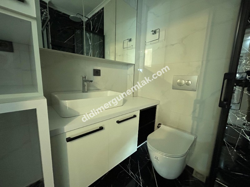 DİDİM EFELER MAHALLESİ' NDE ARA KAT FULL TADİLATLI AYRI MUTFAKLI 3+1 SATILIK DAİRE