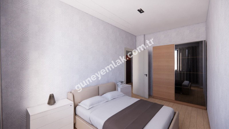 BELEDİYE KARŞI YOLUNDA SATILIK SIFIR APART