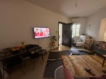 KÜÇÜK KAYMAKLI' DA ZEMİNKAT  SATILIK DAİRE