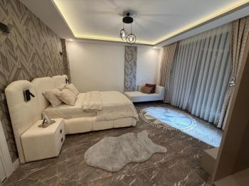 DİDİM HİSAR MAHALLESİNDE 300 m² ARSA İÇERİSİNDE TAM MÜSTAKİL, 4+1 AÇIK MUTFAK, LÜKS MİMARİ TASARIMA SAHİP, FULL LÜKS EŞYALI, KLİMALI, İSKANLI VE KAT MÜLKİYETLİ SATILIK VİLLA