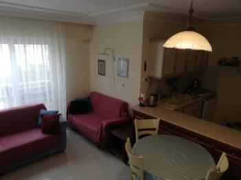  DİDİM CUMHURİYET MAHALLESİNDE ÇARŞAMBA PAZARI YAKININDA 2+1 AÇIK MUTFAK FULL EŞYALI • ASANSÖRLÜ BİNADA • BALKONLU • KİLERLİ • 85 m² SATILIK DAİRE