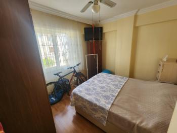 DİDİM ÇAMLIK MAHALLESİNDE EGE CADDESİNDE 1. KAT • 2+1 EŞYALI • 16 YAŞINDA • 75 m² • GENİŞ BALKONLU • BATI CEPHELİ • CADDEYE VE 2 YOLA CEPHELİ SATILIK DAİRE