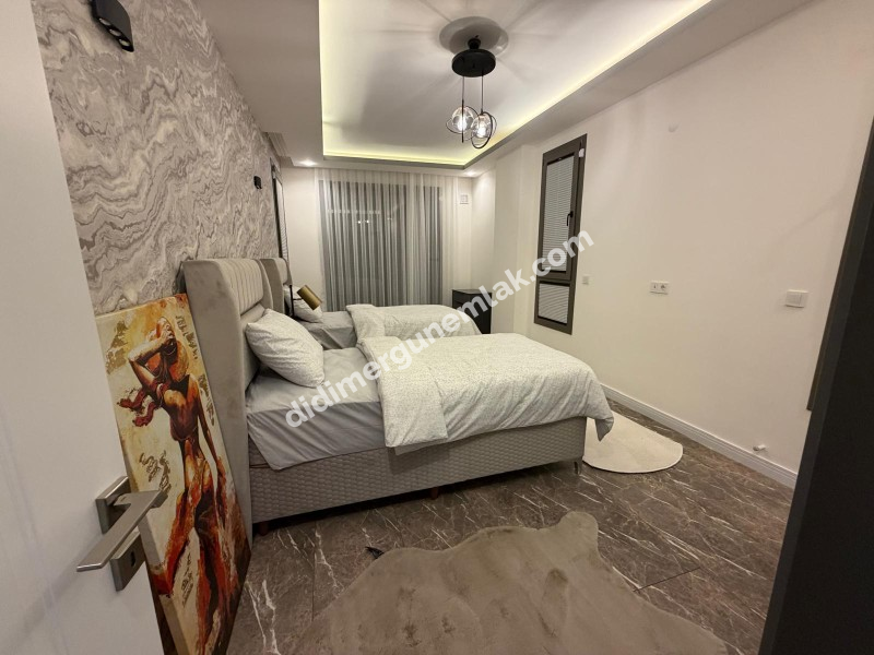 DİDİM HİSAR MAHALLESİNDE 300 m² ARSA İÇERİSİNDE TAM MÜSTAKİL, 4+1 AÇIK MUTFAK, LÜKS MİMARİ TASARIMA SAHİP, FULL LÜKS EŞYALI, KLİMALI, İSKANLI VE KAT MÜLKİYETLİ SATILIK VİLLA