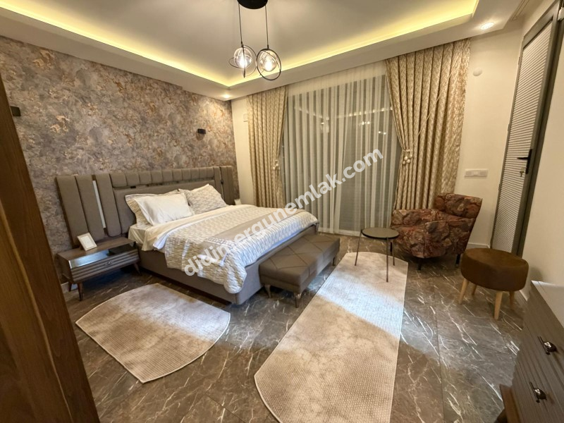 DİDİM HİSAR MAHALLESİNDE 300 m² ARSA İÇERİSİNDE TAM MÜSTAKİL, 4+1 AÇIK MUTFAK, LÜKS MİMARİ TASARIMA SAHİP, FULL LÜKS EŞYALI, KLİMALI, İSKANLI VE KAT MÜLKİYETLİ SATILIK VİLLA