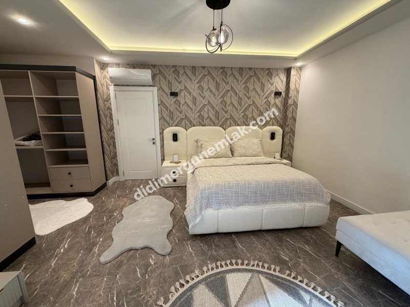 DİDİM HİSAR MAHALLESİNDE 300 m² ARSA İÇERİSİNDE TAM MÜSTAKİL, 4+1 AÇIK MUTFAK, LÜKS MİMARİ TASARIMA SAHİP, FULL LÜKS EŞYALI, KLİMALI, İSKANLI VE KAT MÜLKİYETLİ SATILIK VİLLA