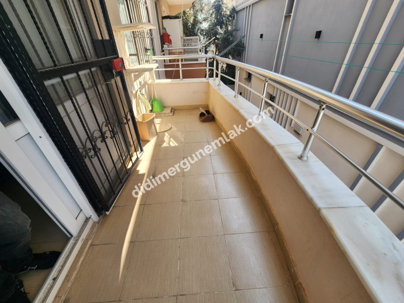 DİDİM ÇAMLIK MAHALLESİNDE EGE CADDESİNDE 1. KAT • 2+1 EŞYALI • 16 YAŞINDA • 75 m² • GENİŞ BALKONLU • BATI CEPHELİ • CADDEYE VE 2 YOLA CEPHELİ SATILIK DAİRE